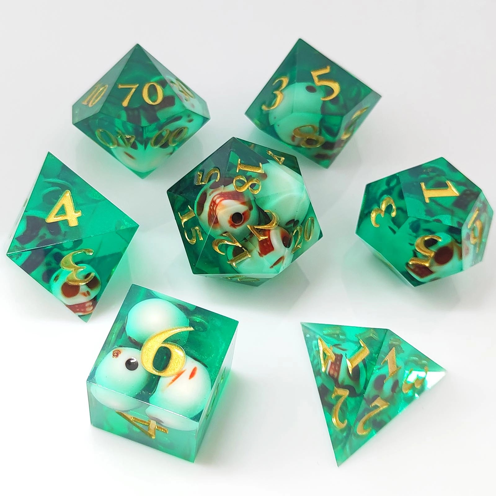 Spectral Skulls Sharp Edged Resin Dice Set - Green Transparent